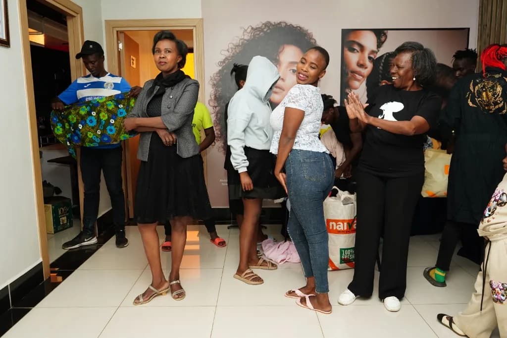 Guests trying on donated clothing