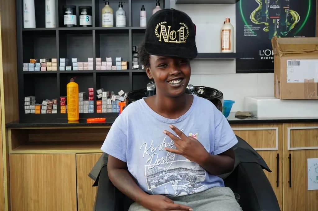 A guest smiling after a fresh look