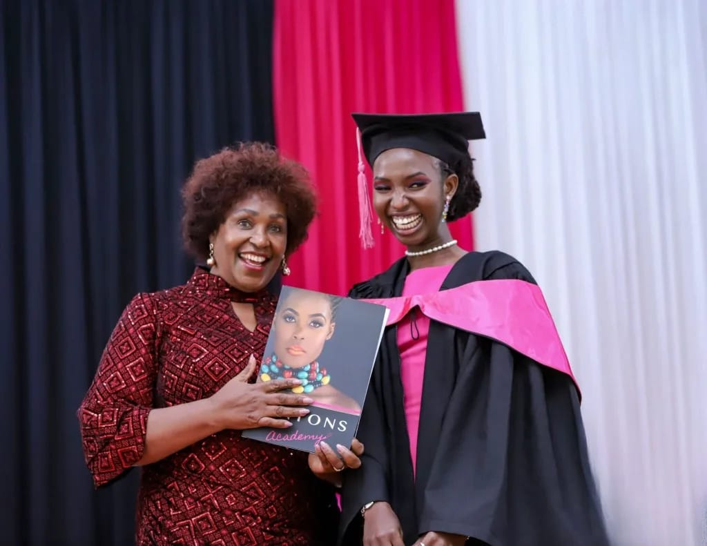 A Lintons Foundation graduate celebrating at her graduation